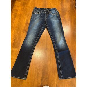 Woman’s silver suki mid slim boot jeans size 28 waist